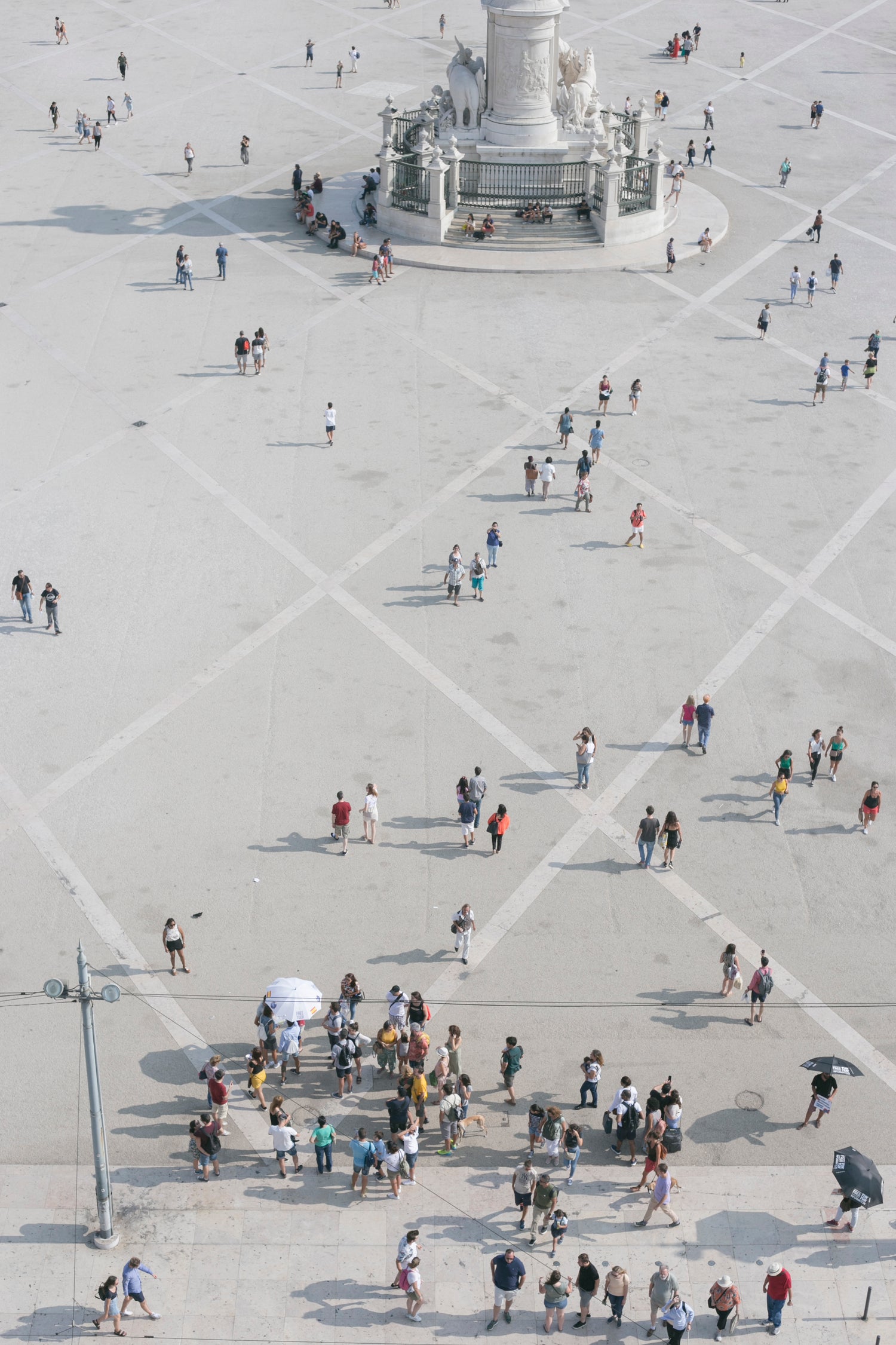 aerial-view-of-people-at-the-rua-augusta-arch